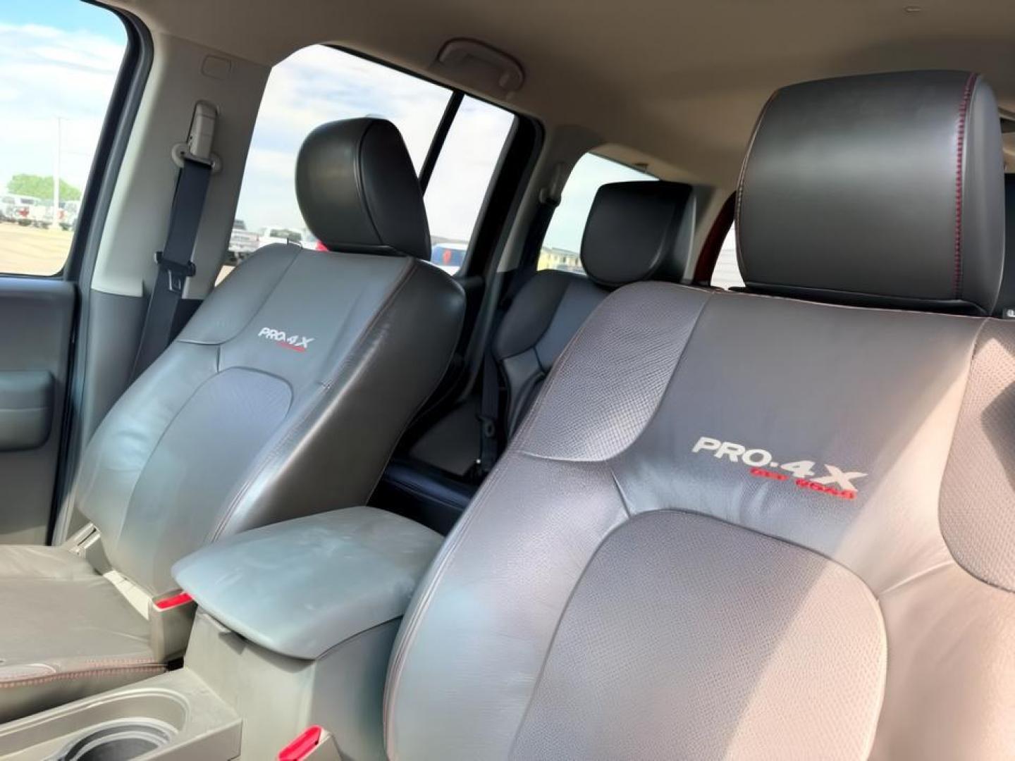 2012 RED /Gray/Steel Nissan Xterra (5N1AN0NW5CC) with an VQ 4L V-6 DOHC engine, Automatic transmission, located at 1175 N Woodruff Ave, Idaho Falls, ID, 83401, 43.506901, -111.999657- Photo#21