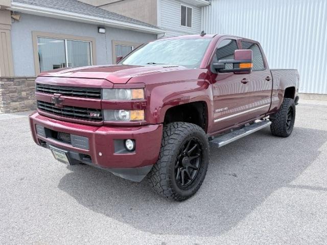 2015 MAROON /Jet Black Chevrolet Silverado 2500HD (1GC1KWE82FF) with an 66L V8 16V OHV TURBO DIESEL engine, Automatic transmission, located at 1175 N Woodruff Ave, Idaho Falls, ID, 83401, 43.506901, -111.999657 - At Timberline Auto, finding a great deal on your next vehicle is always easy! Our experienced sales staff goal is to help find you the right vehicle at the right price! Our knowledgeable finance department has options for almost any credit score. We offer extended service contract options to prot- Photo#29