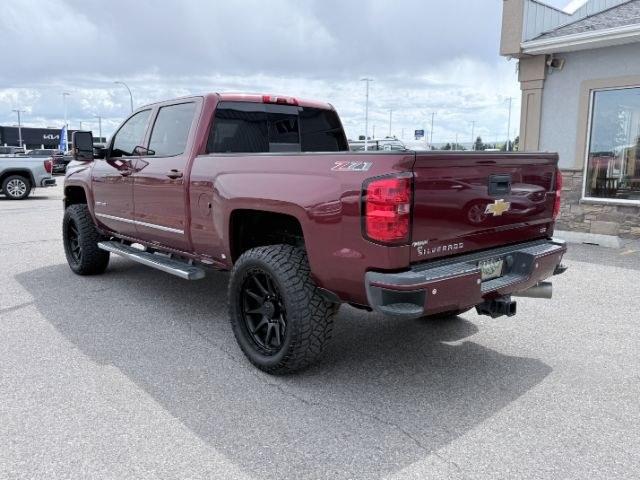 2015 MAROON /Jet Black Chevrolet Silverado 2500HD (1GC1KWE82FF) with an 66L V8 16V OHV TURBO DIESEL engine, Automatic transmission, located at 1175 N Woodruff Ave, Idaho Falls, ID, 83401, 43.506901, -111.999657 - At Timberline Auto, finding a great deal on your next vehicle is always easy! Our experienced sales staff goal is to help find you the right vehicle at the right price! Our knowledgeable finance department has options for almost any credit score. We offer extended service contract options to prot- Photo#31