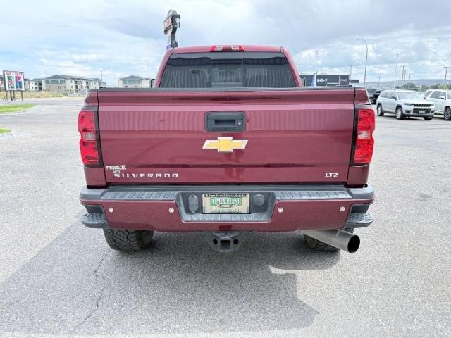 2015 MAROON /Jet Black Chevrolet Silverado 2500HD (1GC1KWE82FF) with an 66L V8 16V OHV TURBO DIESEL engine, Automatic transmission, located at 1175 N Woodruff Ave, Idaho Falls, ID, 83401, 43.506901, -111.999657 - At Timberline Auto, finding a great deal on your next vehicle is always easy! Our experienced sales staff goal is to help find you the right vehicle at the right price! Our knowledgeable finance department has options for almost any credit score. We offer extended service contract options to prot- Photo#32