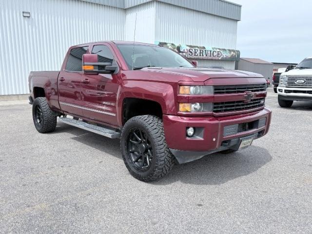 2015 MAROON /Jet Black Chevrolet Silverado 2500HD (1GC1KWE82FF) with an 66L V8 16V OHV TURBO DIESEL engine, Automatic transmission, located at 1175 N Woodruff Ave, Idaho Falls, ID, 83401, 43.506901, -111.999657 - At Timberline Auto, finding a great deal on your next vehicle is always easy! Our experienced sales staff goal is to help find you the right vehicle at the right price! Our knowledgeable finance department has options for almost any credit score. We offer extended service contract options to prot- Photo#37