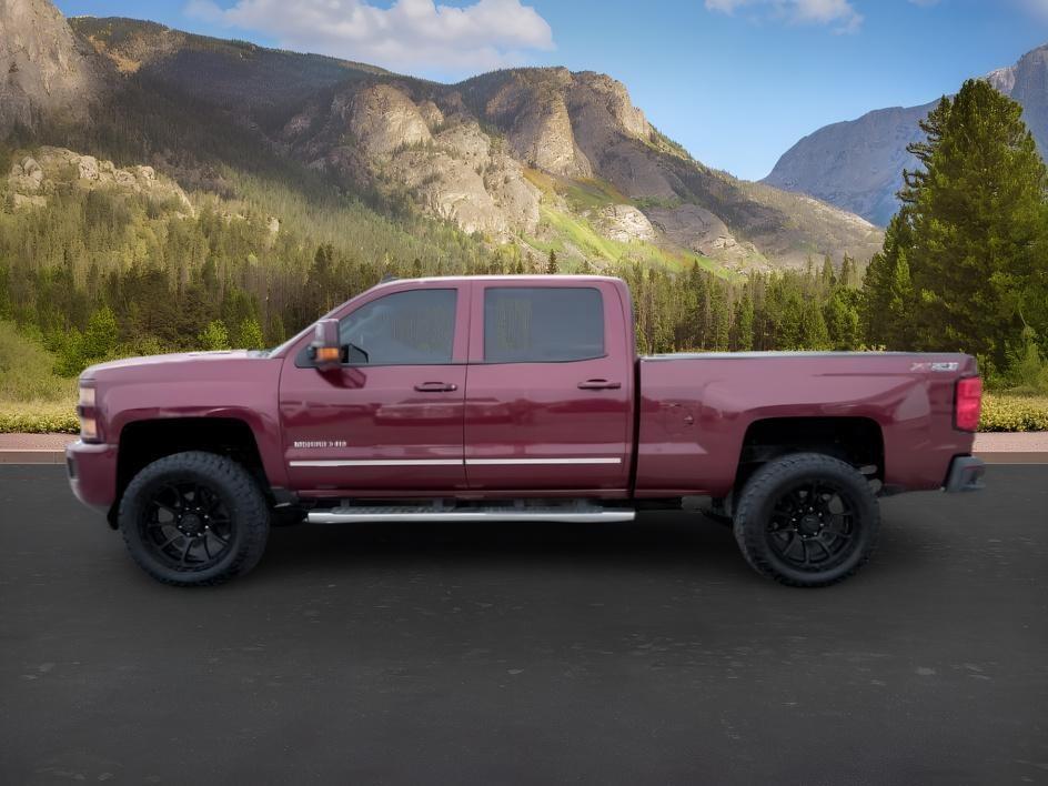 2015 MAROON /Jet Black Chevrolet Silverado 2500HD (1GC1KWE82FF) with an 66L V8 16V OHV TURBO DIESEL engine, Automatic transmission, located at 1175 N Woodruff Ave, Idaho Falls, ID, 83401, 43.506901, -111.999657 - At Timberline Auto, finding a great deal on your next vehicle is always easy! Our experienced sales staff goal is to help find you the right vehicle at the right price! Our knowledgeable finance department has options for almost any credit score. We offer extended service contract options to prot- Photo#1