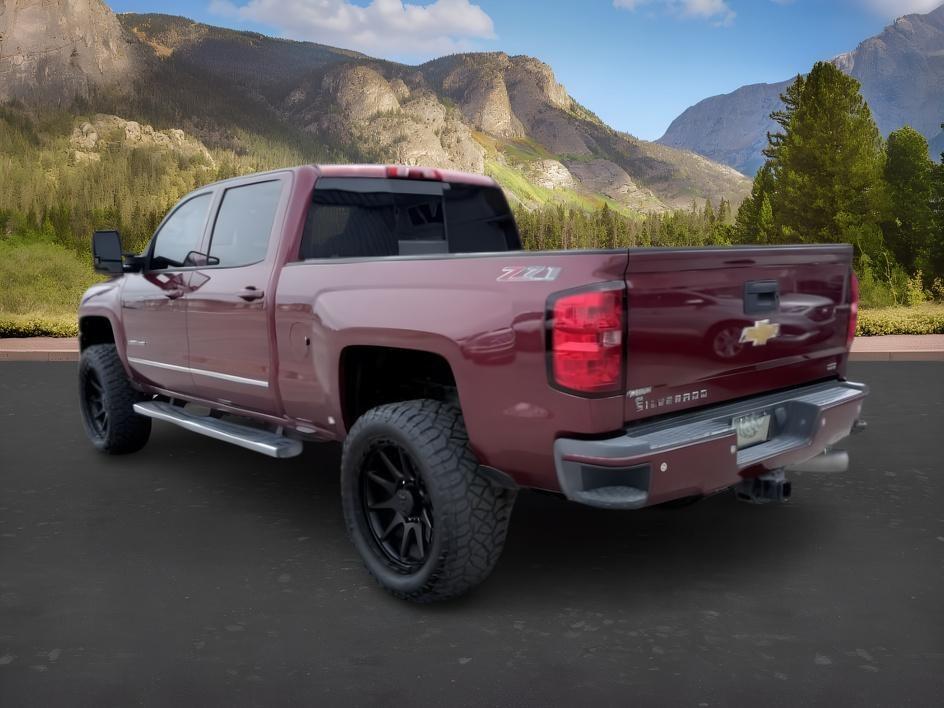 2015 MAROON /Jet Black Chevrolet Silverado 2500HD (1GC1KWE82FF) with an 66L V8 16V OHV TURBO DIESEL engine, Automatic transmission, located at 1175 N Woodruff Ave, Idaho Falls, ID, 83401, 43.506901, -111.999657 - At Timberline Auto, finding a great deal on your next vehicle is always easy! Our experienced sales staff goal is to help find you the right vehicle at the right price! Our knowledgeable finance department has options for almost any credit score. We offer extended service contract options to prot- Photo#2