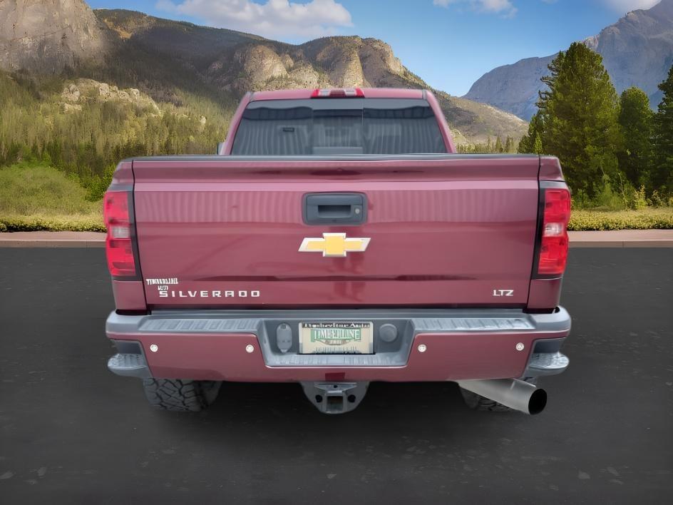 2015 MAROON /Jet Black Chevrolet Silverado 2500HD (1GC1KWE82FF) with an 66L V8 16V OHV TURBO DIESEL engine, Automatic transmission, located at 1175 N Woodruff Ave, Idaho Falls, ID, 83401, 43.506901, -111.999657 - At Timberline Auto, finding a great deal on your next vehicle is always easy! Our experienced sales staff goal is to help find you the right vehicle at the right price! Our knowledgeable finance department has options for almost any credit score. We offer extended service contract options to prot- Photo#3
