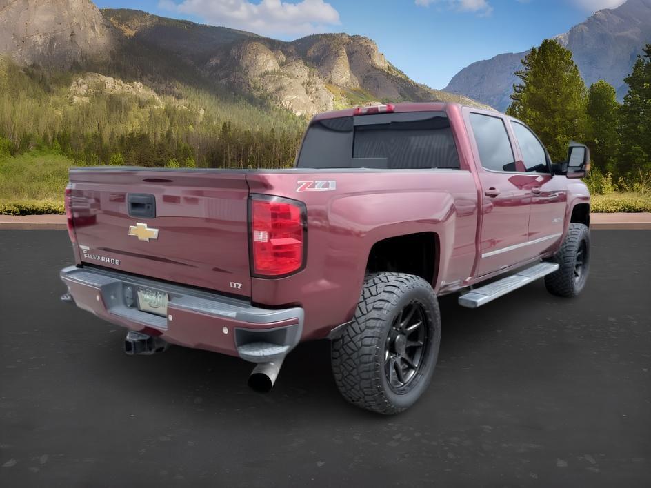 2015 MAROON /Jet Black Chevrolet Silverado 2500HD (1GC1KWE82FF) with an 66L V8 16V OHV TURBO DIESEL engine, Automatic transmission, located at 1175 N Woodruff Ave, Idaho Falls, ID, 83401, 43.506901, -111.999657 - At Timberline Auto, finding a great deal on your next vehicle is always easy! Our experienced sales staff goal is to help find you the right vehicle at the right price! Our knowledgeable finance department has options for almost any credit score. We offer extended service contract options to prot- Photo#6