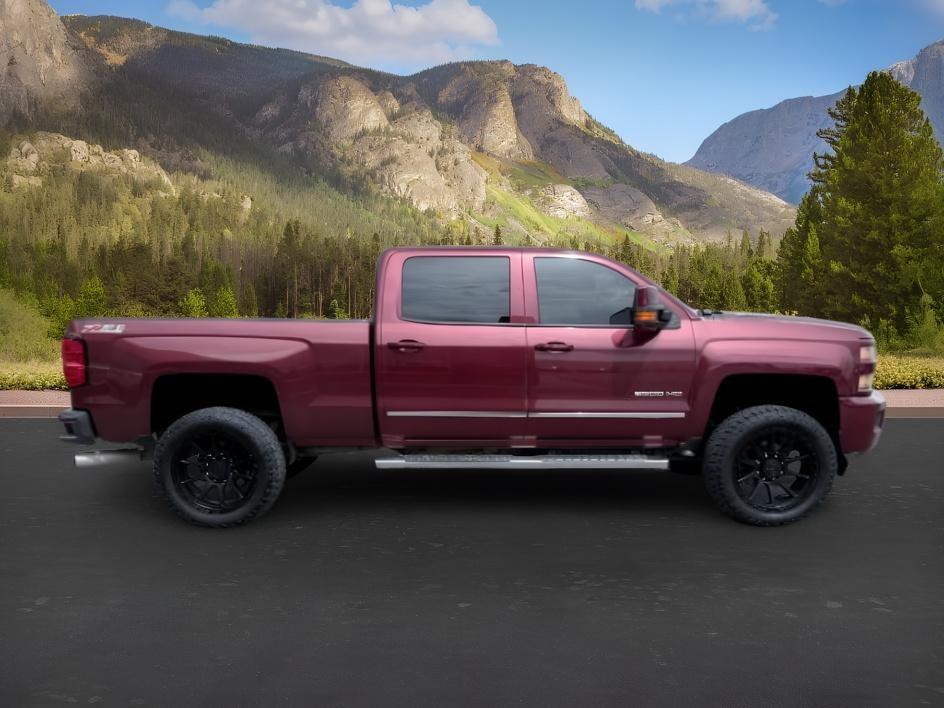 2015 MAROON /Jet Black Chevrolet Silverado 2500HD (1GC1KWE82FF) with an 66L V8 16V OHV TURBO DIESEL engine, Automatic transmission, located at 1175 N Woodruff Ave, Idaho Falls, ID, 83401, 43.506901, -111.999657 - At Timberline Auto, finding a great deal on your next vehicle is always easy! Our experienced sales staff goal is to help find you the right vehicle at the right price! Our knowledgeable finance department has options for almost any credit score. We offer extended service contract options to prot- Photo#7