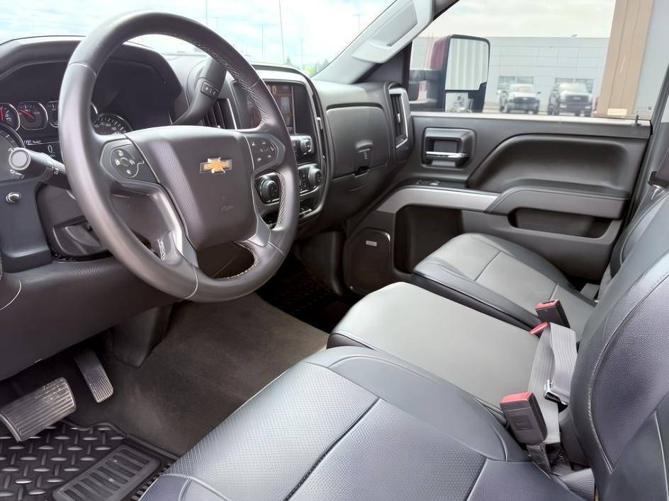 2015 MAROON /Jet Black Chevrolet Silverado 2500HD (1GC1KWE82FF) with an 66L V8 16V OHV TURBO DIESEL engine, Automatic transmission, located at 1175 N Woodruff Ave, Idaho Falls, ID, 83401, 43.506901, -111.999657 - At Timberline Auto, finding a great deal on your next vehicle is always easy! Our experienced sales staff goal is to help find you the right vehicle at the right price! Our knowledgeable finance department has options for almost any credit score. We offer extended service contract options to prot- Photo#14