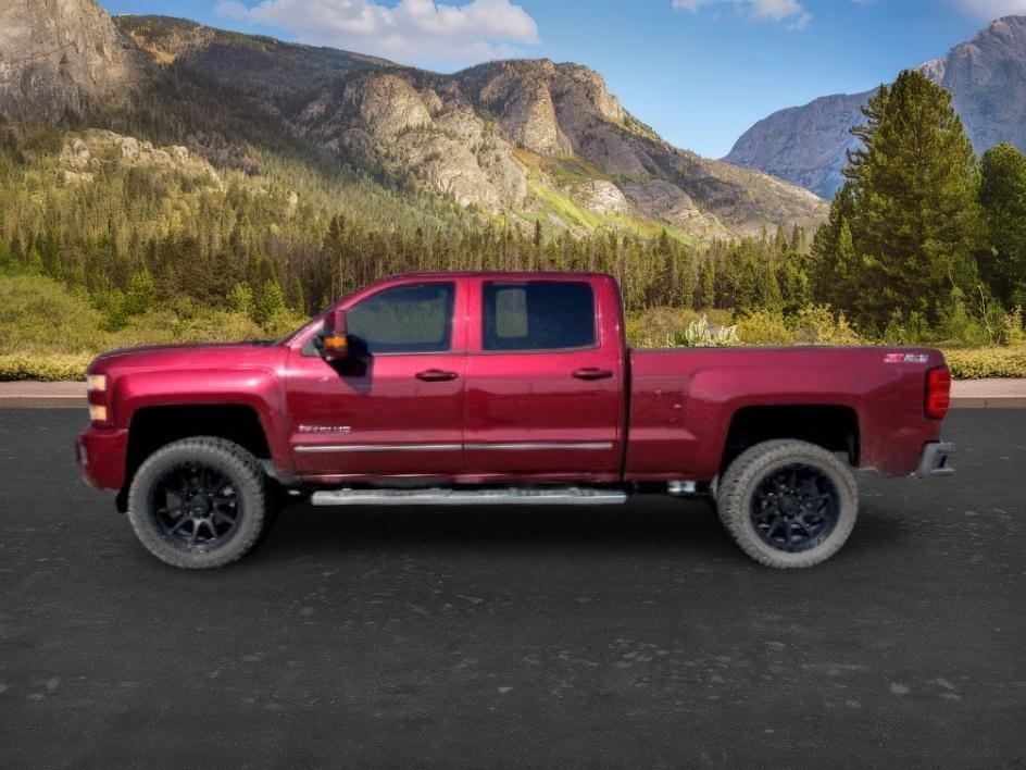 2015 MAROON /Jet Black Chevrolet Silverado 2500HD LTZ (1GC1KWE82FF) with an 6.6L V8 16V OHV TURBO DIESEL engine, AUTOMATIC transmission, located at 1235 N Woodruff Ave., Idaho Falls, 83401, (208) 523-1053, 43.507172, -112.000488 - At Timberline Auto, finding a great deal on your next vehicle is always easy! Our experienced sales staff goal is to help find you the right vehicle at the right price! Our knowledgeable finance department has options for almost any credit score. We offer extended service contract options to prot- Photo#0
