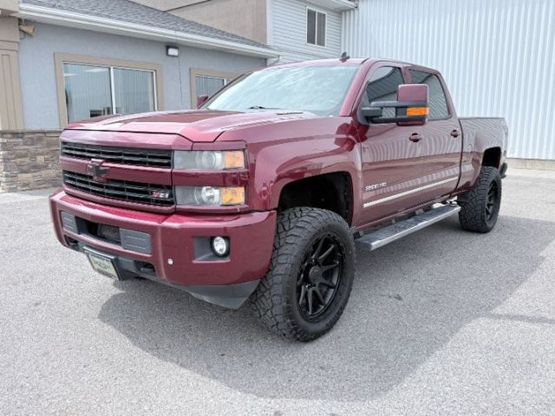 2015 Deep Ruby Metallic /Jet Black Chevrolet Silverado LTZ (1GC1KWE82FF) with an V8, 6.6L engine, 6-speed automatic transmission, located at 1175 N Woodruff Ave, Idaho Falls, ID, 83401, 43.506901, -111.999657 - <b>Vehicle Details</b><br>Experience capability and comfort in this 2015 Chevrolet Silverado 2500 LTZ 4WD, a heavy-duty pickup built to handle demanding work and weekend adventures alike. Powered by a V8, 6.6L Diesel engine, this Chevrolet Silverado delivers impressive towing confidence, strong perf- Photo#0