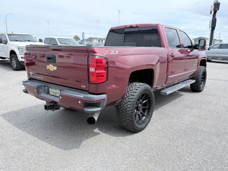 2015 Deep Ruby Metallic /Jet Black Chevrolet Silverado LTZ (1GC1KWE82FF) with an V8, 6.6L engine, 6-speed automatic transmission, located at 1175 N Woodruff Ave, Idaho Falls, ID, 83401, 43.506901, -111.999657 - <b>Vehicle Details</b><br>Experience capability and comfort in this 2015 Chevrolet Silverado 2500 LTZ 4WD, a heavy-duty pickup built to handle demanding work and weekend adventures alike. Powered by a V8, 6.6L Diesel engine, this Chevrolet Silverado delivers impressive towing confidence, strong perf- Photo#6