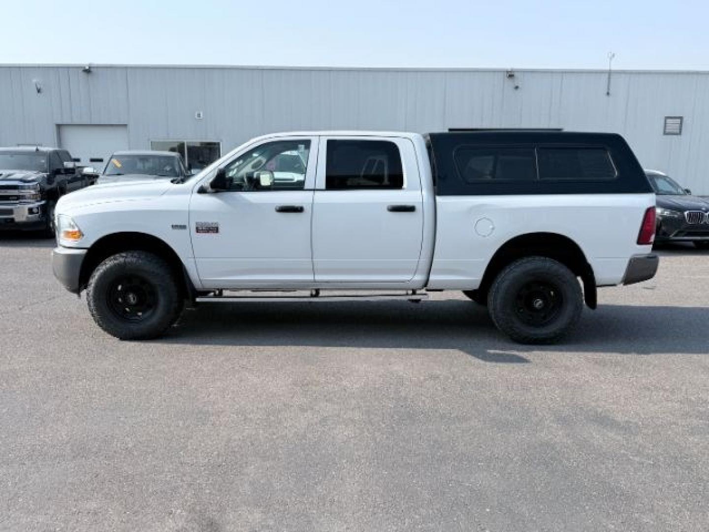 2011 WHITE /Dark Slate/Medium Graystone Ram Ram 2500 (3D7TT2CT6BG) with an HEMI Magnum 57L V-8 variable valve control engine, Automatic transmission, located at 1175 N Woodruff Ave, Idaho Falls, ID, 83401, 43.506901, -111.999657 - At Timberline Auto, finding a great deal on your next vehicle is always easy! Our experienced sales staff goal is to help find you the right vehicle at the right price! Our knowledgeable finance department has options for almost any credit score. We offer extended service contract options to prot- Photo#24