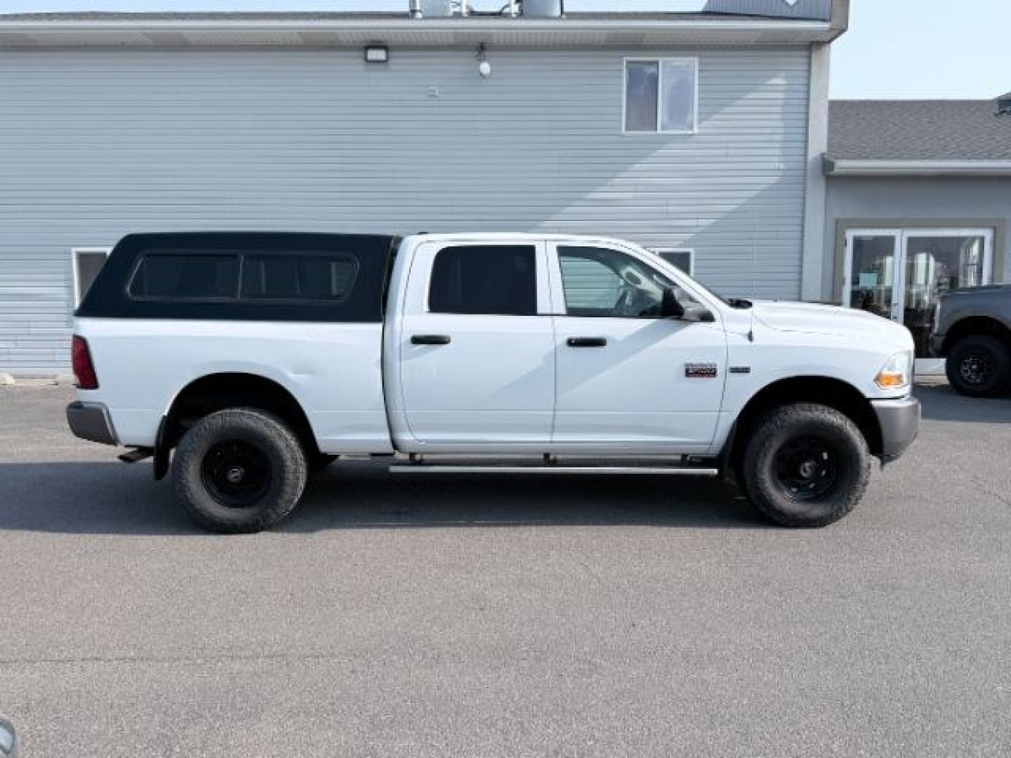 2011 WHITE /Dark Slate/Medium Graystone Ram Ram 2500 (3D7TT2CT6BG) with an HEMI Magnum 57L V-8 variable valve control engine, Automatic transmission, located at 1175 N Woodruff Ave, Idaho Falls, ID, 83401, 43.506901, -111.999657 - At Timberline Auto, finding a great deal on your next vehicle is always easy! Our experienced sales staff goal is to help find you the right vehicle at the right price! Our knowledgeable finance department has options for almost any credit score. We offer extended service contract options to prot- Photo#28