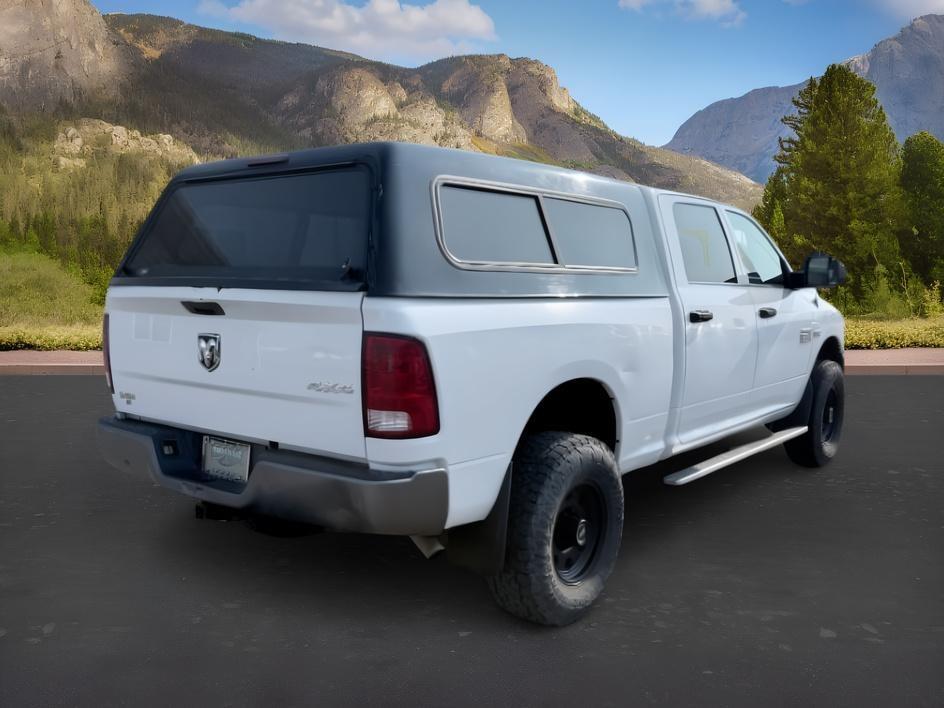 2011 WHITE /Dark Slate/Medium Graystone Ram Ram 2500 (3D7TT2CT6BG) with an HEMI Magnum 57L V-8 variable valve control engine, Automatic transmission, located at 1175 N Woodruff Ave, Idaho Falls, ID, 83401, 43.506901, -111.999657 - At Timberline Auto, finding a great deal on your next vehicle is always easy! Our experienced sales staff goal is to help find you the right vehicle at the right price! Our knowledgeable finance department has options for almost any credit score. We offer extended service contract options to prot- Photo#4