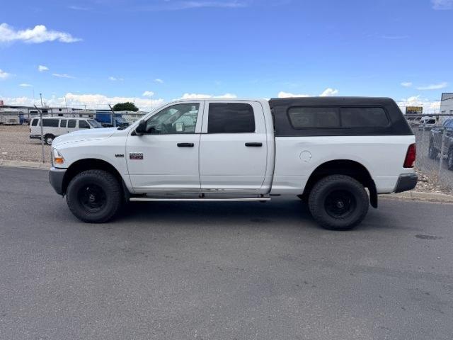 2011 WHITE /Dark Slate/Medium Graystone Ram Ram 2500 (3D7TT2CT6BG) with an HEMI Magnum 57L V-8 variable valve control engine, Automatic transmission, located at 1175 N Woodruff Ave, Idaho Falls, ID, 83401, 43.506901, -111.999657 - At Timberline Auto, finding a great deal on your next vehicle is always easy! Our experienced sales staff goal is to help find you the right vehicle at the right price! Our knowledgeable finance department has options for almost any credit score. We offer extended service contract options to prot- Photo#1