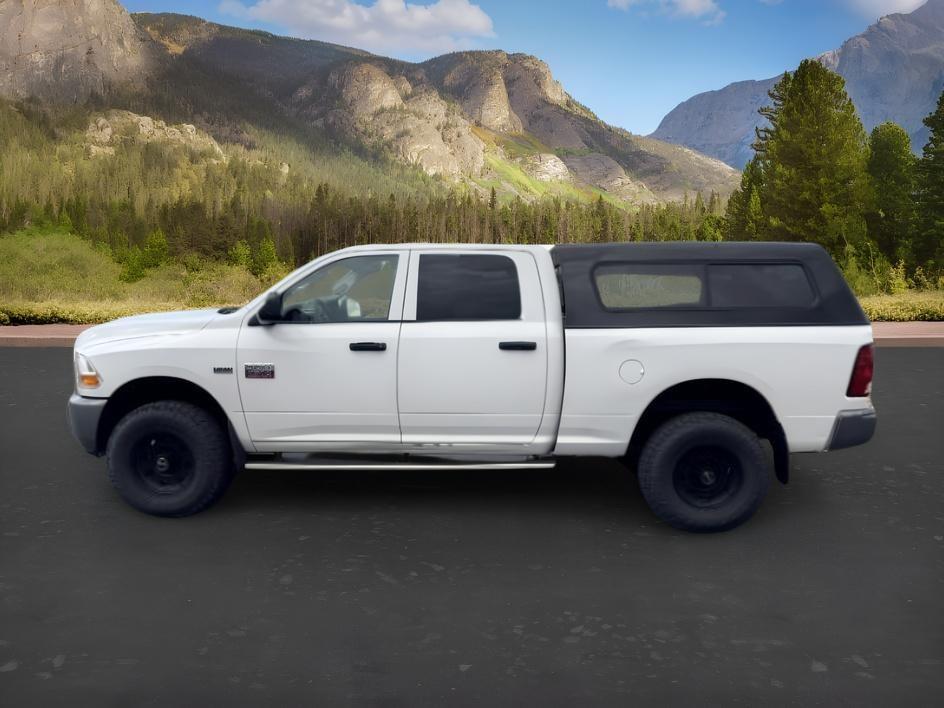 2011 WHITE /Dark Slate/Medium Graystone Ram Ram 2500 (3D7TT2CT6BG) with an HEMI Magnum 57L V-8 variable valve control engine, Automatic transmission, located at 1175 N Woodruff Ave, Idaho Falls, ID, 83401, 43.506901, -111.999657 - At Timberline Auto, finding a great deal on your next vehicle is always easy! Our experienced sales staff goal is to help find you the right vehicle at the right price! Our knowledgeable finance department has options for almost any credit score. We offer extended service contract options to prot- Photo#0