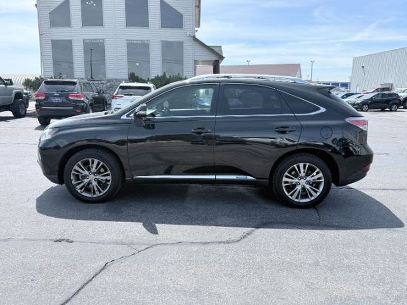2013 Stargazer Black /LEATHER Lexus RX 450h Base (JTJBC1BA6D2) with an V6, 3.5L engine, CVT transmission, located at 1175 N Woodruff Ave, Idaho Falls, ID, 83401, 43.506901, -111.999657 - <b>Vehicle Details</b><br>Discover refined comfort and confident capability in this 2013 Lexus RX 450h Base, now available in Idaho Falls, ID. This luxury hybrid SUV blends premium craftsmanship with a smooth V6, 3.5L Full Hybrid Electric (FHEV) engine and dependable 4WD, making it an excellent choi- Photo#1