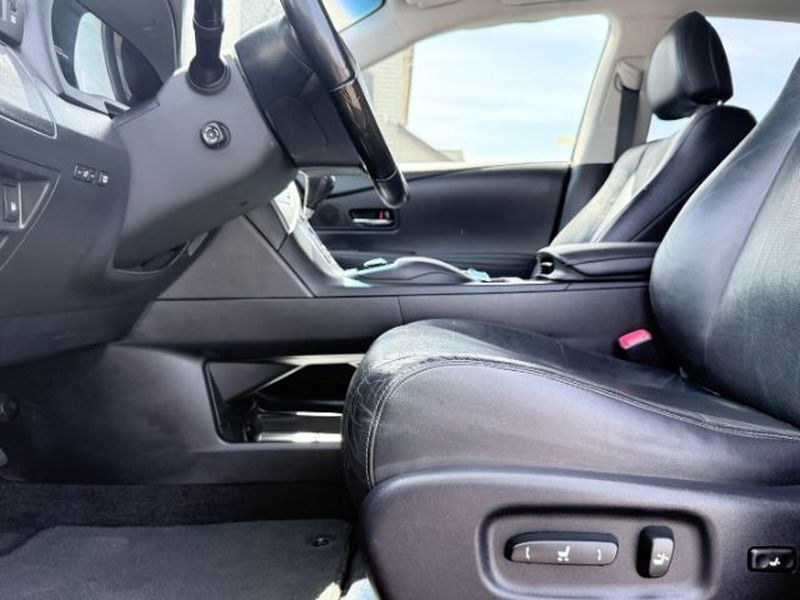 2013 Stargazer Black /LEATHER Lexus RX 450h Base (JTJBC1BA6D2) with an V6, 3.5L engine, CVT transmission, located at 1175 N Woodruff Ave, Idaho Falls, ID, 83401, 43.506901, -111.999657 - <b>Vehicle Details</b><br>Discover refined comfort and confident capability in this 2013 Lexus RX 450h Base, now available in Idaho Falls, ID. This luxury hybrid SUV blends premium craftsmanship with a smooth V6, 3.5L Full Hybrid Electric (FHEV) engine and dependable 4WD, making it an excellent choi- Photo#15
