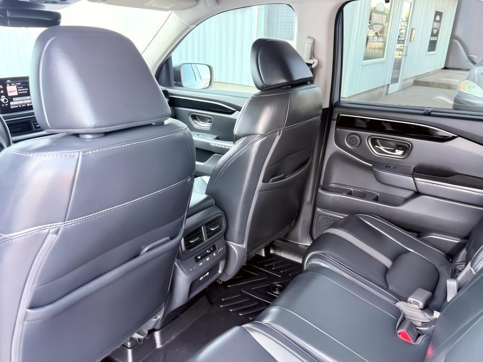 2023 Sonic Gray Pearl /Black Honda Pilot Touring (5FNYG2H75PB) with an V6, 3.5L engine, 10-speed automatic transmission, located at 1175 N Woodruff Ave, Idaho Falls, ID, 83401, 43.506901, -111.999657 - <b>Vehicle Details</b><br>Experience the confidence and comfort of this pre-owned 2023 Honda Pilot Touring, a refined three-row SUV built to handle busy family schedules, weekend road trips, and everyday driving with ease. Powered by a strong V6, 3.5L gasoline engine, this Honda Pilot delivers smoot- Photo#62