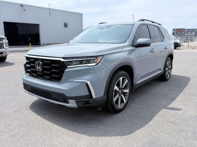 2023 Sonic Gray Pearl /Black Honda Pilot Touring (5FNYG2H75PB) with an V6, 3.5L engine, 10-speed automatic transmission, located at 1175 N Woodruff Ave, Idaho Falls, ID, 83401, 43.506901, -111.999657 - <b>Vehicle Details</b><br>Experience the confidence and comfort of this pre-owned 2023 Honda Pilot Touring, a refined three-row SUV built to handle busy family schedules, weekend road trips, and everyday driving with ease. Powered by a strong V6, 3.5L gasoline engine, this Honda Pilot delivers smoot- Photo#64