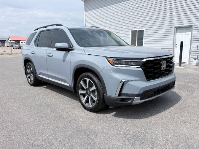 2023 Sonic Gray Pearl /Black Honda Pilot Touring (5FNYG2H75PB) with an V6, 3.5L engine, 10-speed automatic transmission, located at 1175 N Woodruff Ave, Idaho Falls, ID, 83401, 43.506901, -111.999657 - <b>Vehicle Details</b><br>Experience the confidence and comfort of this pre-owned 2023 Honda Pilot Touring, a refined three-row SUV built to handle busy family schedules, weekend road trips, and everyday driving with ease. Powered by a strong V6, 3.5L gasoline engine, this Honda Pilot delivers smoot- Photo#75