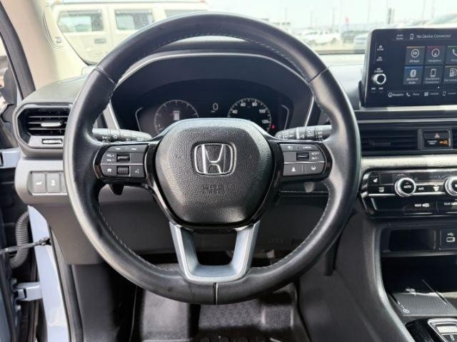 2023 Sonic Gray Pearl /Black Honda Pilot Touring (5FNYG2H75PB) with an V6, 3.5L engine, 10-speed automatic transmission, located at 1175 N Woodruff Ave, Idaho Falls, ID, 83401, 43.506901, -111.999657 - <b>Vehicle Details</b><br>Experience the confidence and comfort of this pre-owned 2023 Honda Pilot Touring, a refined three-row SUV built to handle busy family schedules, weekend road trips, and everyday driving with ease. Powered by a strong V6, 3.5L gasoline engine, this Honda Pilot delivers smoot- Photo#82