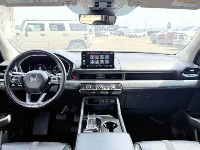 2023 Sonic Gray Pearl /Black Honda Pilot Touring (5FNYG2H75PB) with an V6, 3.5L engine, 10-speed automatic transmission, located at 1175 N Woodruff Ave, Idaho Falls, ID, 83401, 43.506901, -111.999657 - <b>Vehicle Details</b><br>Experience the confidence and comfort of this pre-owned 2023 Honda Pilot Touring, a refined three-row SUV built to handle busy family schedules, weekend road trips, and everyday driving with ease. Powered by a strong V6, 3.5L gasoline engine, this Honda Pilot delivers smoot- Photo#92