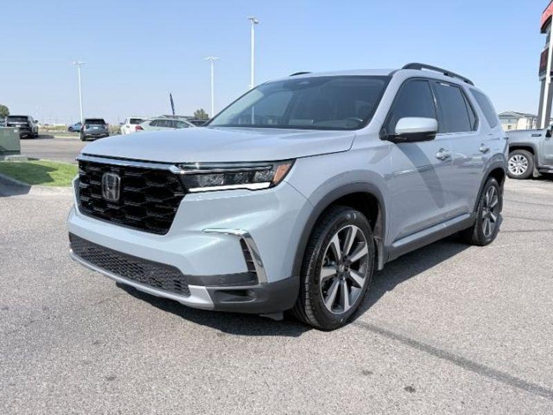 2023 Sonic Gray Pearl /Black Honda Pilot Touring (5FNYG2H75PB) with an V6, 3.5L engine, 10-speed automatic transmission, located at 1175 N Woodruff Ave, Idaho Falls, ID, 83401, 43.506901, -111.999657 - <b>Vehicle Details</b><br>Experience the confidence and comfort of this pre-owned 2023 Honda Pilot Touring, a refined three-row SUV built to handle busy family schedules, weekend road trips, and everyday driving with ease. Powered by a strong V6, 3.5L gasoline engine, this Honda Pilot delivers smoot- Photo#0