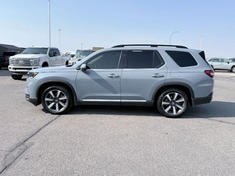 2023 Sonic Gray Pearl /Black Honda Pilot Touring (5FNYG2H75PB) with an V6, 3.5L engine, 10-speed automatic transmission, located at 1175 N Woodruff Ave, Idaho Falls, ID, 83401, 43.506901, -111.999657 - <b>Vehicle Details</b><br>Experience the confidence and comfort of this pre-owned 2023 Honda Pilot Touring, a refined three-row SUV built to handle busy family schedules, weekend road trips, and everyday driving with ease. Powered by a strong V6, 3.5L gasoline engine, this Honda Pilot delivers smoot- Photo#1