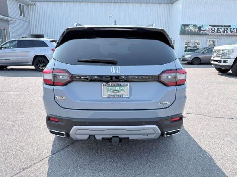 2023 Sonic Gray Pearl /Black Honda Pilot Touring (5FNYG2H75PB) with an V6, 3.5L engine, 10-speed automatic transmission, located at 1175 N Woodruff Ave, Idaho Falls, ID, 83401, 43.506901, -111.999657 - <b>Vehicle Details</b><br>Experience the confidence and comfort of this pre-owned 2023 Honda Pilot Touring, a refined three-row SUV built to handle busy family schedules, weekend road trips, and everyday driving with ease. Powered by a strong V6, 3.5L gasoline engine, this Honda Pilot delivers smoot- Photo#3