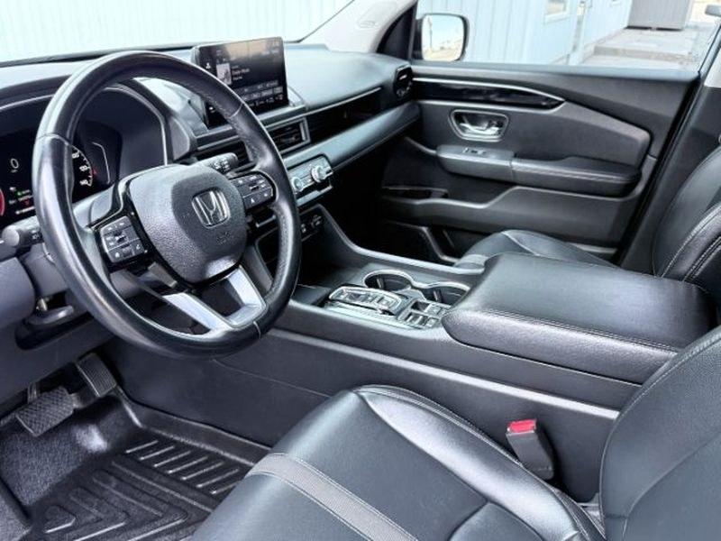 2023 Sonic Gray Pearl /Black Honda Pilot Touring (5FNYG2H75PB) with an V6, 3.5L engine, 10-speed automatic transmission, located at 1175 N Woodruff Ave, Idaho Falls, ID, 83401, 43.506901, -111.999657 - <b>Vehicle Details</b><br>Experience the confidence and comfort of this pre-owned 2023 Honda Pilot Touring, a refined three-row SUV built to handle busy family schedules, weekend road trips, and everyday driving with ease. Powered by a strong V6, 3.5L gasoline engine, this Honda Pilot delivers smoot- Photo#16
