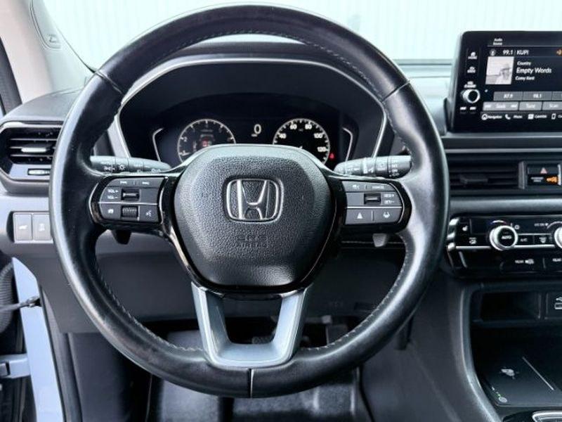 2023 Sonic Gray Pearl /Black Honda Pilot Touring (5FNYG2H75PB) with an V6, 3.5L engine, 10-speed automatic transmission, located at 1175 N Woodruff Ave, Idaho Falls, ID, 83401, 43.506901, -111.999657 - <b>Vehicle Details</b><br>Experience the confidence and comfort of this pre-owned 2023 Honda Pilot Touring, a refined three-row SUV built to handle busy family schedules, weekend road trips, and everyday driving with ease. Powered by a strong V6, 3.5L gasoline engine, this Honda Pilot delivers smoot- Photo#17