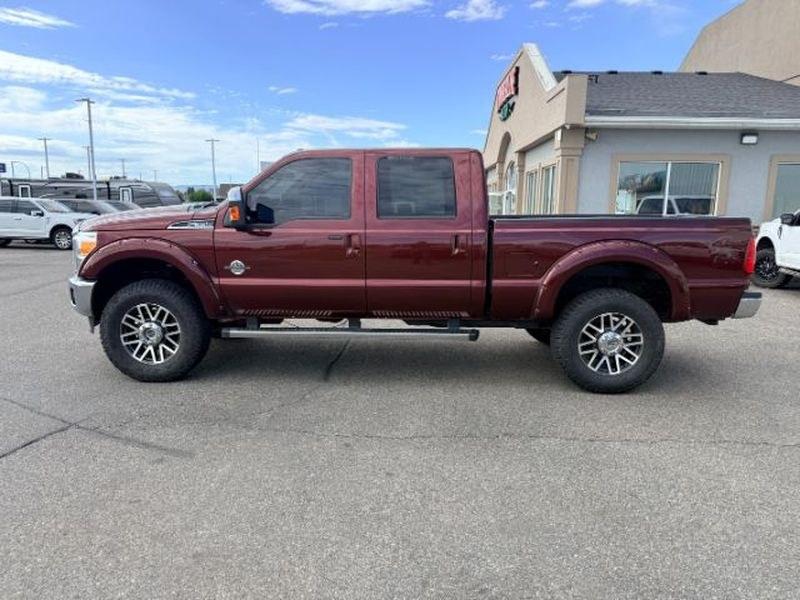 2016 Bronze Fire Metallic /Steel, vinyl Ford F-350 Lariat (1FT8W3BT4GE) with an V8, 6.7L engine, 6-Speed Automatic transmission, located at 1175 N Woodruff Ave, Idaho Falls, ID, 83401, 43.506901, -111.999657 - <b>Vehicle Details</b><br>Looking for a powerful and well-equipped heavy-duty pickup? This 2016 Ford F-350 Super Duty Lariat Crew Cab 4WD is ready to tackle demanding jobs, towing, and everyday driving with confidence. Powered by a strong V8, 6.7L Diesel engine and equipped with 4WD, this Ford F-350- Photo#1