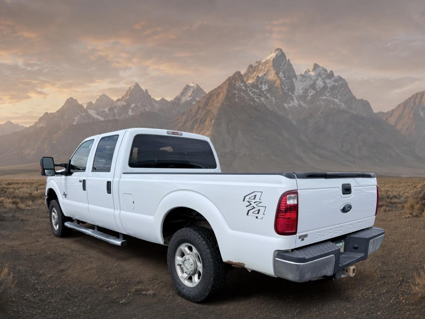 2013 Oxford White /GRAY Ford F-250 XLT (1FT7W2BT1DE) with an V8, 6.7L engine, 6-speed automatic transmission, located at 1175 N Woodruff Ave, Idaho Falls, ID, 83401, 43.506901, -111.999657 - <b>Vehicle Details</b><br>Looking for a powerful heavy-duty truck in Idaho Falls, ID? Check out this pre-owned 2013 Ford F-250 Super Duty XLT FX4 LARIAT XL 4WD, built to handle tough jobs and weekend adventures with confidence. Under the hood is a V8 6.7L Diesel engine delivering strong towing capab- Photo#2
