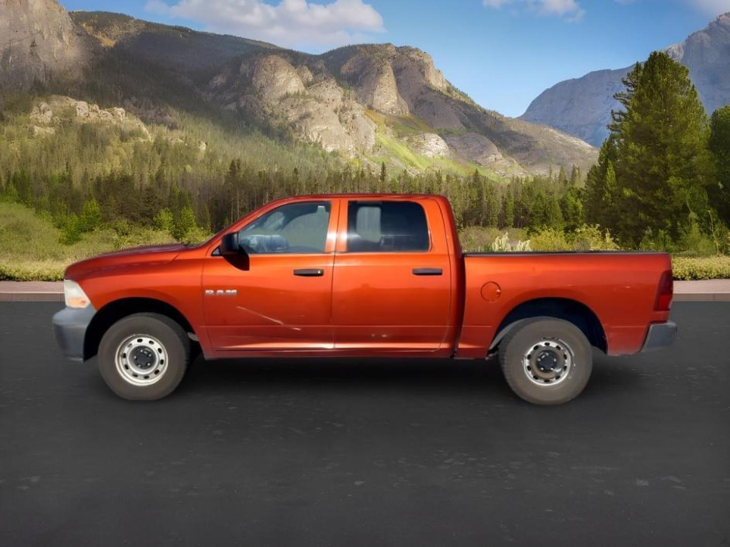 2009 ORANGE /CLOTH Dodge Ram 1500 (1D3HV13P09S) with an 47L V8 MAGNUM engine, Automatic transmission, located at 1175 N Woodruff Ave, Idaho Falls, ID, 83401, 43.506901, -111.999657 - At Timberline Auto, finding a great deal on your next vehicle is always easy! Our experienced sales staff goal is to help find you the right vehicle at the right price! Our knowledgeable finance department has options for almost any credit score. We offer extended service contract options to prot- Photo#0