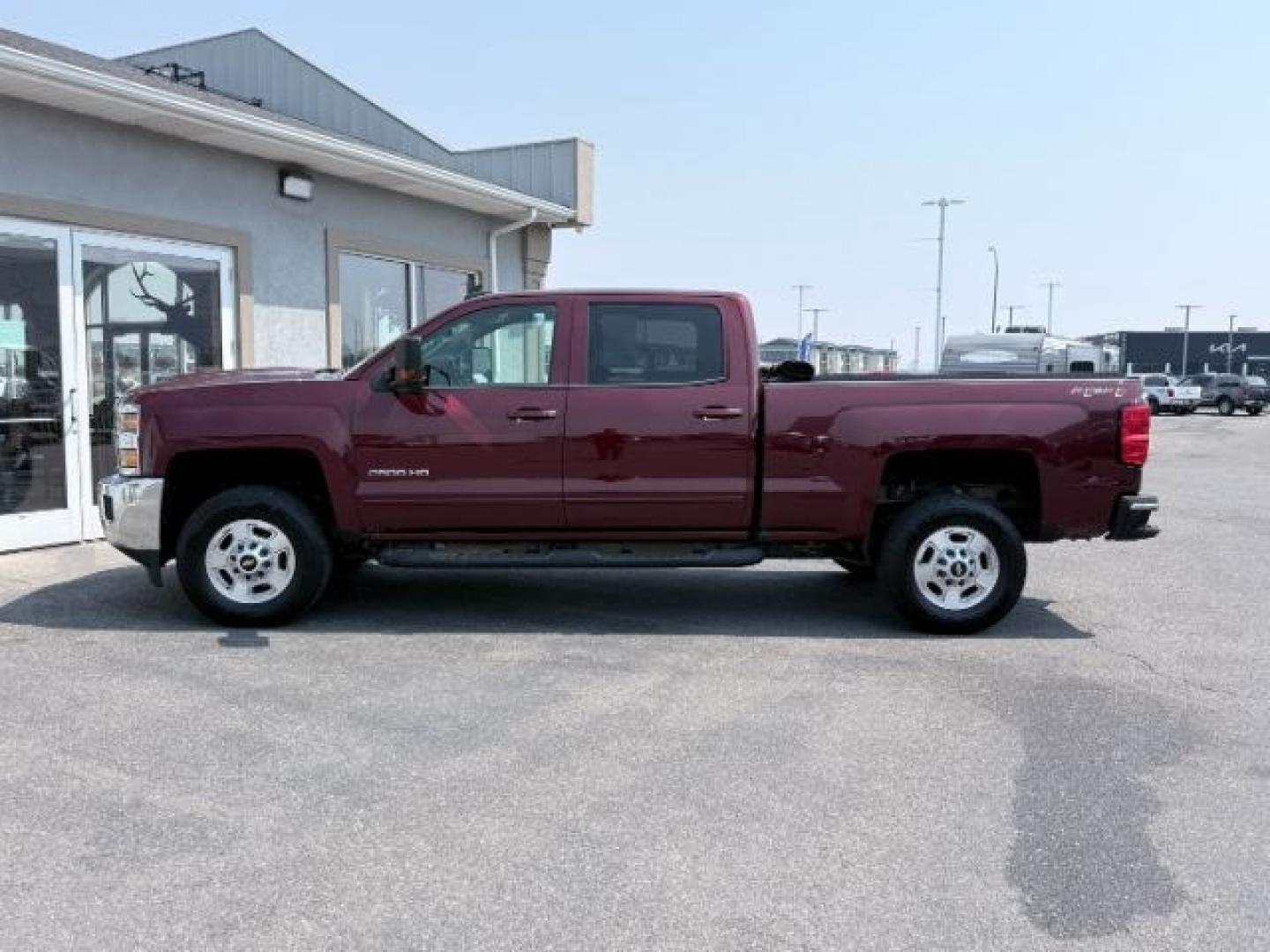2017 MAROON /Jet Black Chevrolet Silverado 2500HD (1GC1KVEY1HF) with an Vortec 6L V-8 variable valve control engine, Automatic transmission, located at 1175 N Woodruff Ave, Idaho Falls, ID, 83401, 43.506901, -111.999657 - At Timberline Auto, finding a great deal on your next vehicle is always easy! Our experienced sales staff goal is to help find you the right vehicle at the right price! Our knowledgeable finance department has options for almost any credit score. We offer extended service contract options to prot- Photo#1