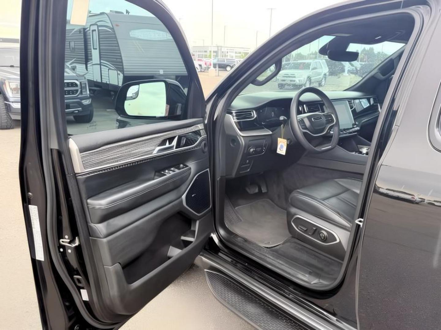2022 BLACK /Global Black Jeep Wagoneer (1C4SJVBT0NS) with an HEMI 57L V-8 variable valve control engine, Automatic transmission, located at 1175 N Woodruff Ave, Idaho Falls, ID, 83401, 43.506901, -111.999657 - At Timberline Auto, finding a great deal on your next vehicle is always easy! Our experienced sales staff goal is to help find you the right vehicle at the right price! Our knowledgeable finance department has options for almost any credit score. We offer extended service contract options to prot- Photo#13