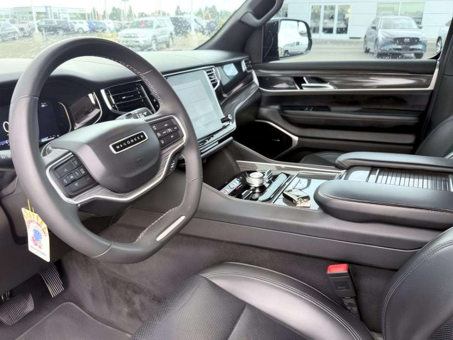 2022 BLACK /Global Black Jeep Wagoneer (1C4SJVBT0NS) with an HEMI 57L V-8 variable valve control engine, Automatic transmission, located at 1175 N Woodruff Ave, Idaho Falls, ID, 83401, 43.506901, -111.999657 - At Timberline Auto, finding a great deal on your next vehicle is always easy! Our experienced sales staff goal is to help find you the right vehicle at the right price! Our knowledgeable finance department has options for almost any credit score. We offer extended service contract options to prot- Photo#15