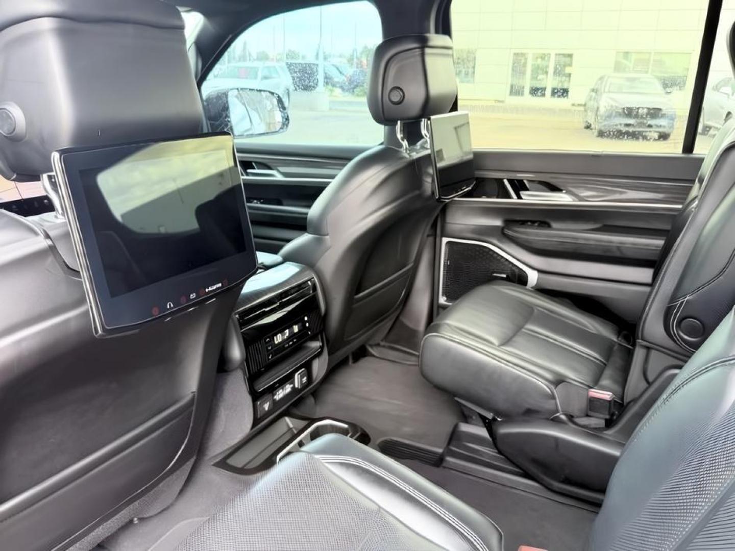 2022 BLACK /Global Black Jeep Wagoneer (1C4SJVBT0NS) with an HEMI 57L V-8 variable valve control engine, Automatic transmission, located at 1175 N Woodruff Ave, Idaho Falls, ID, 83401, 43.506901, -111.999657 - At Timberline Auto, finding a great deal on your next vehicle is always easy! Our experienced sales staff goal is to help find you the right vehicle at the right price! Our knowledgeable finance department has options for almost any credit score. We offer extended service contract options to prot- Photo#29
