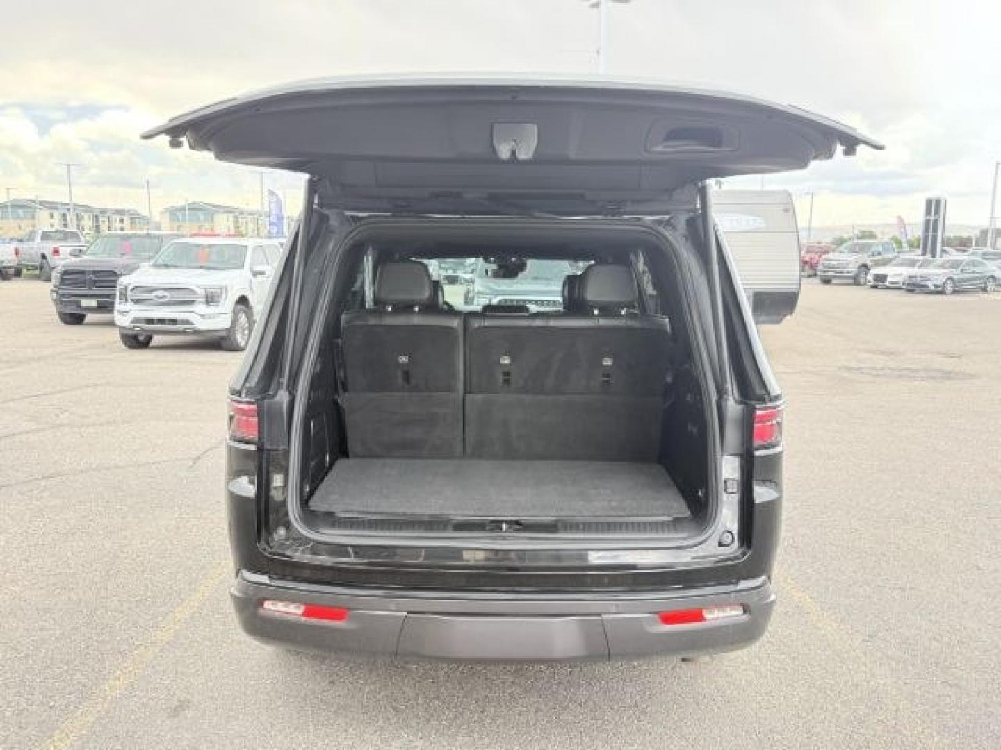 2022 BLACK /Global Black Jeep Wagoneer (1C4SJVBT0NS) with an HEMI 57L V-8 variable valve control engine, Automatic transmission, located at 1175 N Woodruff Ave, Idaho Falls, ID, 83401, 43.506901, -111.999657 - At Timberline Auto, finding a great deal on your next vehicle is always easy! Our experienced sales staff goal is to help find you the right vehicle at the right price! Our knowledgeable finance department has options for almost any credit score. We offer extended service contract options to prot- Photo#35