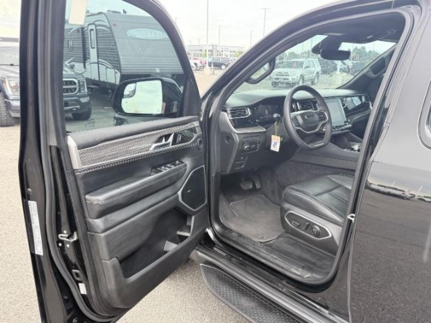 2022 BLACK /Global Black Jeep Wagoneer (1C4SJVBT0NS) with an HEMI 57L V-8 variable valve control engine, Automatic transmission, located at 1175 N Woodruff Ave, Idaho Falls, ID, 83401, 43.506901, -111.999657 - At Timberline Auto, finding a great deal on your next vehicle is always easy! Our experienced sales staff goal is to help find you the right vehicle at the right price! Our knowledgeable finance department has options for almost any credit score. We offer extended service contract options to prot- Photo#44