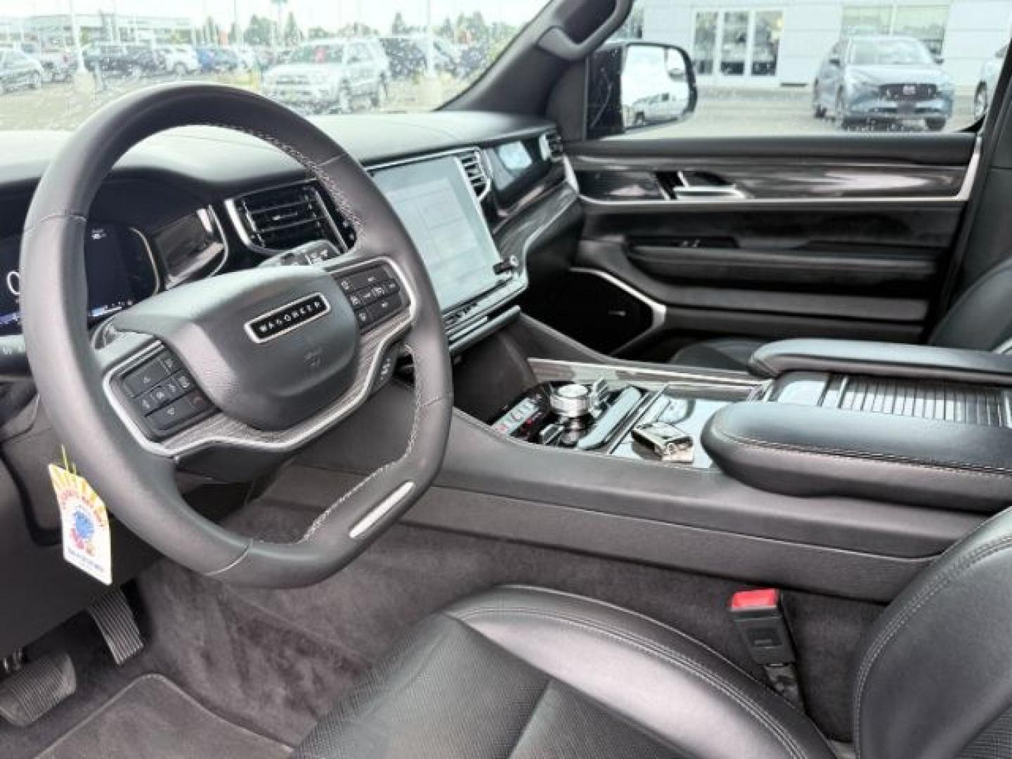 2022 BLACK /Global Black Jeep Wagoneer (1C4SJVBT0NS) with an HEMI 57L V-8 variable valve control engine, Automatic transmission, located at 1175 N Woodruff Ave, Idaho Falls, ID, 83401, 43.506901, -111.999657 - At Timberline Auto, finding a great deal on your next vehicle is always easy! Our experienced sales staff goal is to help find you the right vehicle at the right price! Our knowledgeable finance department has options for almost any credit score. We offer extended service contract options to prot- Photo#46