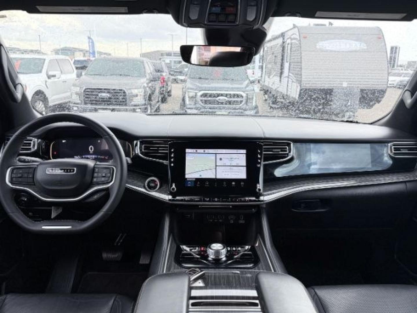 2022 BLACK /Global Black Jeep Wagoneer (1C4SJVBT0NS) with an HEMI 57L V-8 variable valve control engine, Automatic transmission, located at 1175 N Woodruff Ave, Idaho Falls, ID, 83401, 43.506901, -111.999657 - At Timberline Auto, finding a great deal on your next vehicle is always easy! Our experienced sales staff goal is to help find you the right vehicle at the right price! Our knowledgeable finance department has options for almost any credit score. We offer extended service contract options to prot- Photo#58