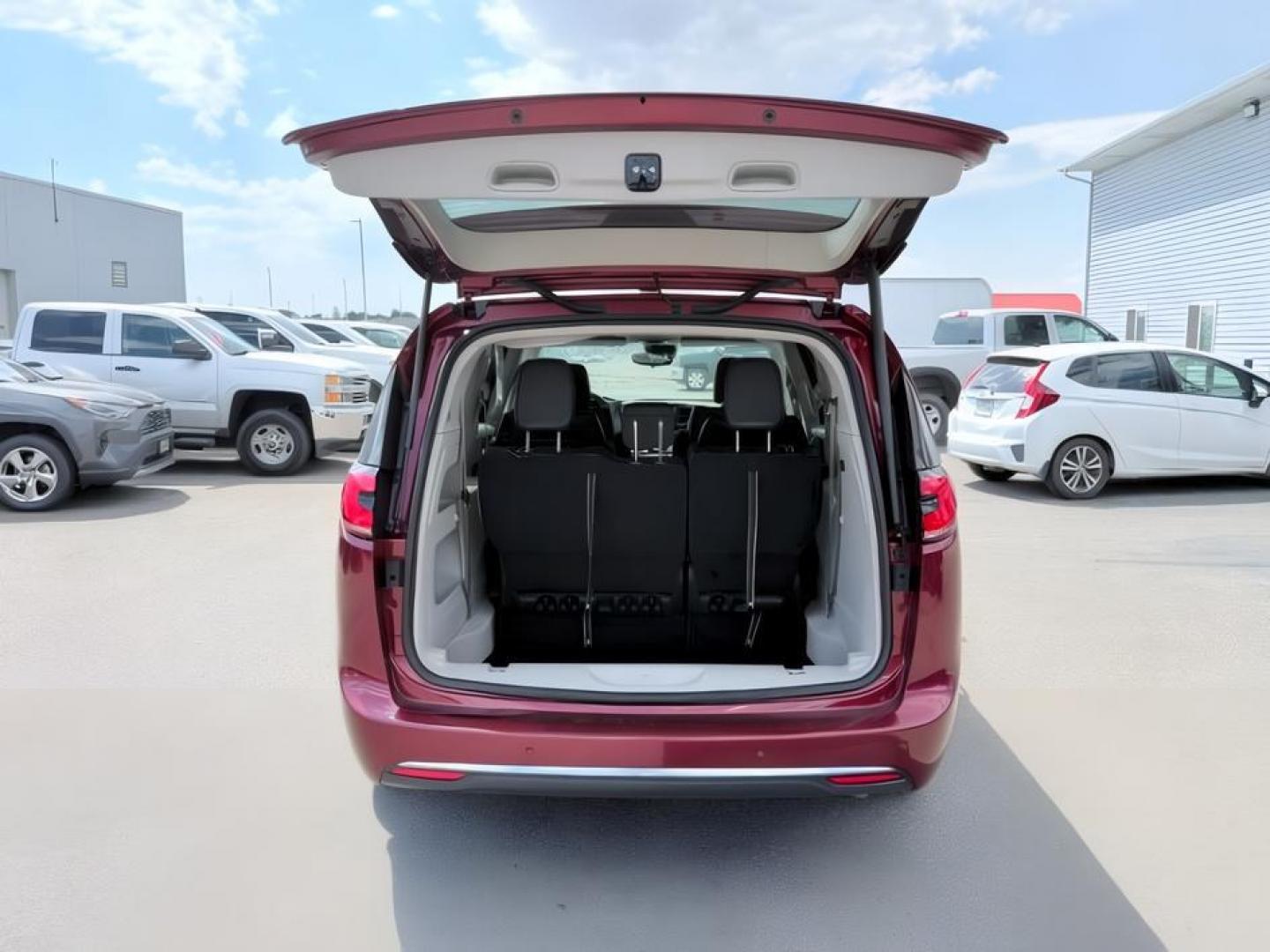 2023 MAROON /Black/Alloy/Black Chrysler Pacifica (2C4RC3BG0PR) with an Pentastar 36L V-6 DOHC engine, Automatic transmission, located at 1175 N Woodruff Ave, Idaho Falls, ID, 83401, 43.506901, -111.999657- Photo#5