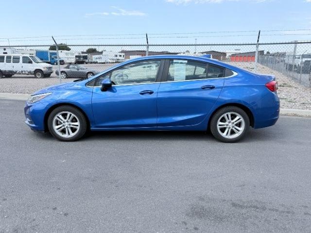 2017 BLUE /Jet Black Chevrolet Cruze LT Auto (1G1BE5SM4H7) with an 1.4L I-4 gasoline direct injection engine, AUTOMATIC transmission, located at 1235 N Woodruff Ave., Idaho Falls, 83401, (208) 523-1053, 43.507172, -112.000488 - At Timberline Auto, finding a great deal on your next vehicle is always easy! Our experienced sales staff goal is to help find you the right vehicle at the right price! Our knowledgeable finance department has options for almost any credit score. We offer extended service contract options to prot- Photo#1