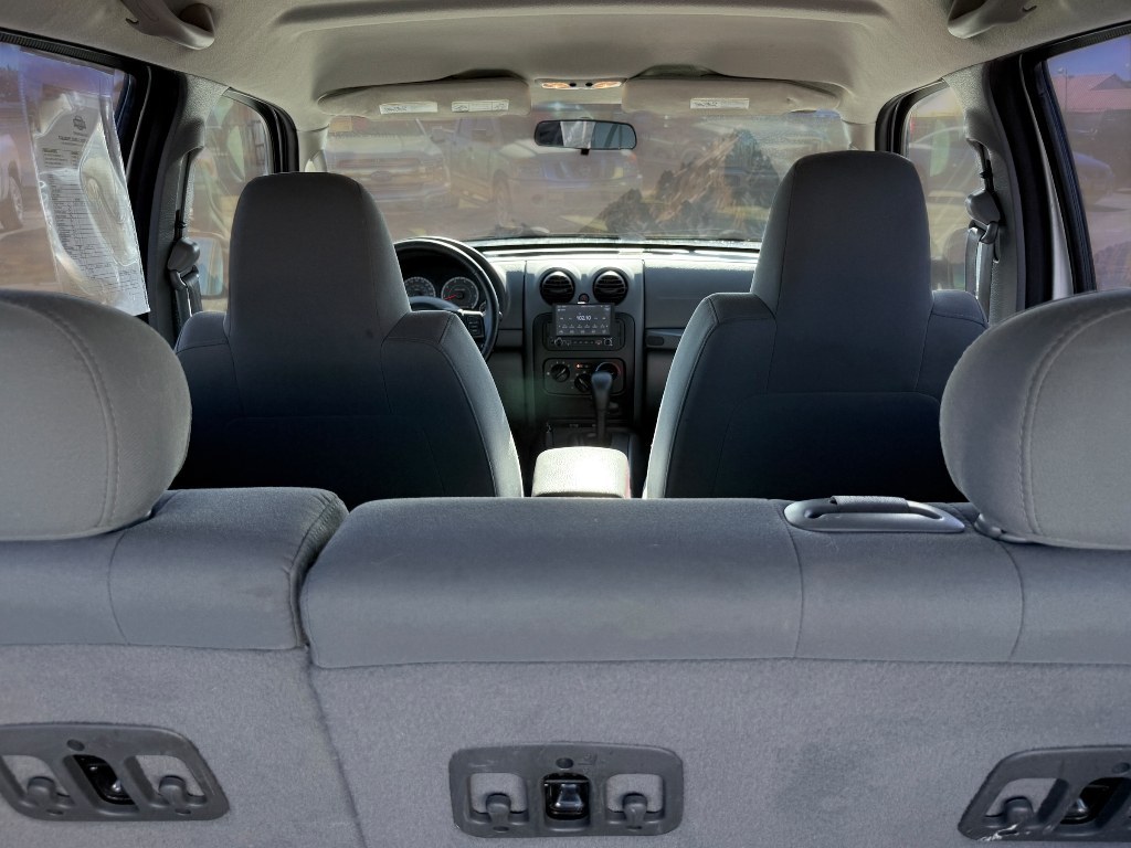 2007 Bright Silver Metallic Clearcoat /Medium Slate Gray Jeep Liberty Sport (1J4GL48K87W) with an V6, 3.7L (225 CID) engine, 6-speed manual transmission, located at 1175 N Woodruff Ave, Idaho Falls, ID, 83401, 43.506901, -111.999657 - <b>Vehicle Details</b><br>Looking for a dependable SUV with capability, comfort, and proven value? This 2007 Jeep Liberty Sport is ready for your next adventure. Equipped with 4WD and a V6, 3.7L (225 CID) gasoline engine, this Jeep delivers the strength you want for commuting, weekend trips, and Ida- Photo#4