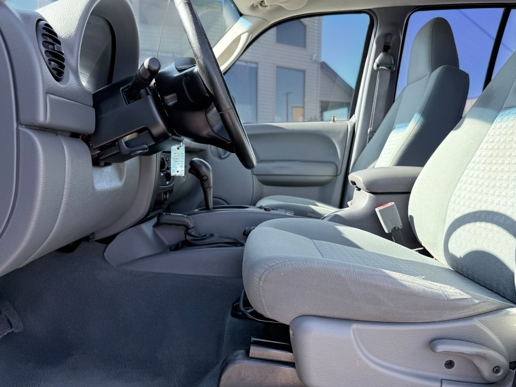 2007 Bright Silver Metallic Clearcoat /Medium Slate Gray Jeep Liberty Sport (1J4GL48K87W) with an V6, 3.7L (225 CID) engine, 6-speed manual transmission, located at 1175 N Woodruff Ave, Idaho Falls, ID, 83401, 43.506901, -111.999657 - <b>Vehicle Details</b><br>Looking for a dependable SUV with capability, comfort, and proven value? This 2007 Jeep Liberty Sport is ready for your next adventure. Equipped with 4WD and a V6, 3.7L (225 CID) gasoline engine, this Jeep delivers the strength you want for commuting, weekend trips, and Ida- Photo#11