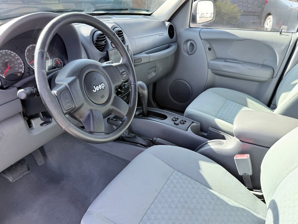 2007 Bright Silver Metallic Clearcoat /Medium Slate Gray Jeep Liberty Sport (1J4GL48K87W) with an V6, 3.7L (225 CID) engine, 6-speed manual transmission, located at 1175 N Woodruff Ave, Idaho Falls, ID, 83401, 43.506901, -111.999657 - <b>Vehicle Details</b><br>Looking for a dependable SUV with capability, comfort, and proven value? This 2007 Jeep Liberty Sport is ready for your next adventure. Equipped with 4WD and a V6, 3.7L (225 CID) gasoline engine, this Jeep delivers the strength you want for commuting, weekend trips, and Ida- Photo#12