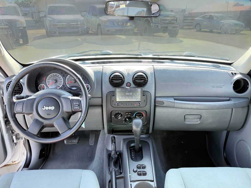 2007 Bright Silver Metallic Clearcoat /Medium Slate Gray Jeep Liberty Sport (1J4GL48K87W) with an V6, 3.7L (225 CID) engine, 6-speed manual transmission, located at 1175 N Woodruff Ave, Idaho Falls, ID, 83401, 43.506901, -111.999657 - <b>Vehicle Details</b><br>Looking for a dependable SUV with capability, comfort, and proven value? This 2007 Jeep Liberty Sport is ready for your next adventure. Equipped with 4WD and a V6, 3.7L (225 CID) gasoline engine, this Jeep delivers the strength you want for commuting, weekend trips, and Ida- Photo#18