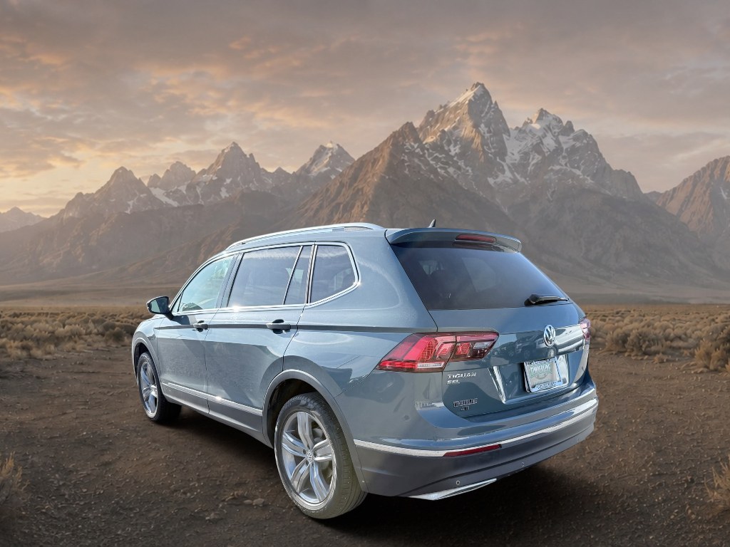 2020 Silk Blue Metallic /Titan Black Volkswagen Tiguan SEL (3VV2B7AXXLM) with an 4 Cyl, 2.0L engine, 8-speed automatic transmission, located at 1175 N Woodruff Ave, Idaho Falls, ID, 83401, 43.506901, -111.999657 - <b>Vehicle Details</b><br>Take on every drive with this 2020 Volkswagen Tiguan 2.0T SE / 2.0T SEL / 2.0T SE R-Line Black, a stylish and versatile SUV with only 38,794 miles and the confidence of AWD. Powered by a responsive 4-cylinder, 2.0L gasoline engine, this Volkswagen Tiguan delivers smooth per- Photo#2