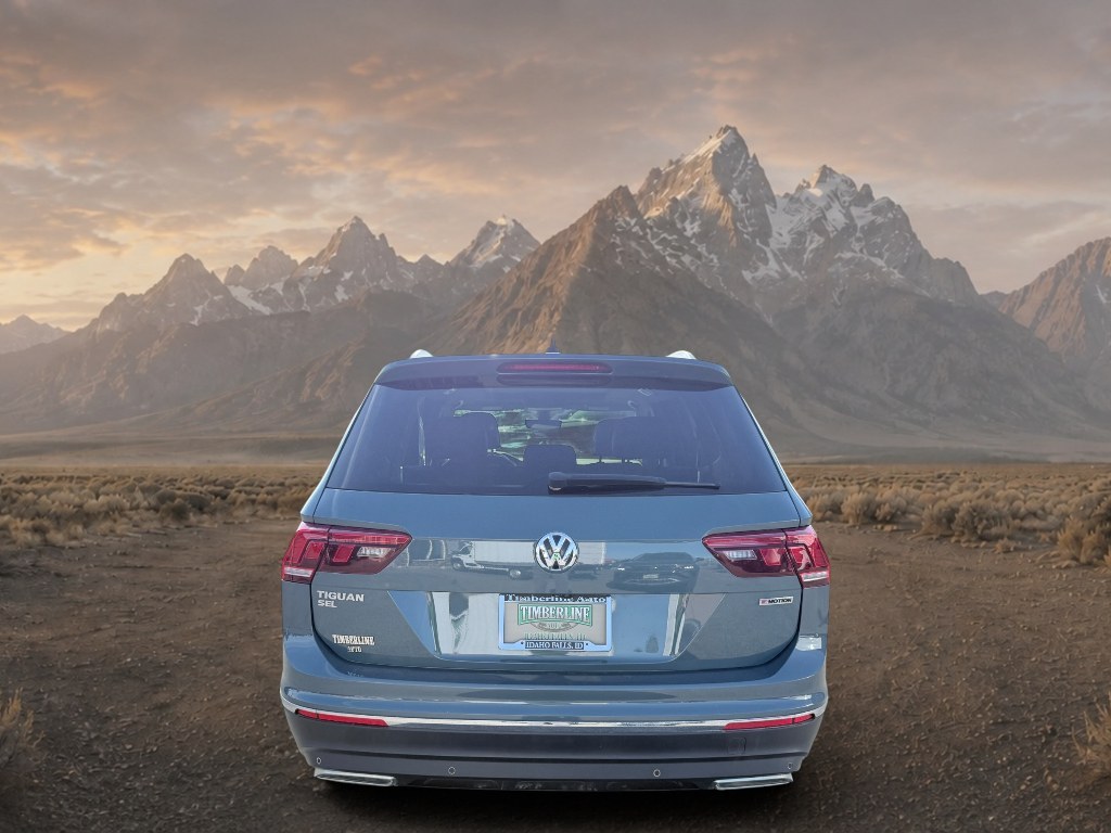 2020 Silk Blue Metallic /Titan Black Volkswagen Tiguan SEL (3VV2B7AXXLM) with an 4 Cyl, 2.0L engine, 8-speed automatic transmission, located at 1175 N Woodruff Ave, Idaho Falls, ID, 83401, 43.506901, -111.999657 - <b>Vehicle Details</b><br>Take on every drive with this 2020 Volkswagen Tiguan 2.0T SE / 2.0T SEL / 2.0T SE R-Line Black, a stylish and versatile SUV with only 38,794 miles and the confidence of AWD. Powered by a responsive 4-cylinder, 2.0L gasoline engine, this Volkswagen Tiguan delivers smooth per- Photo#3